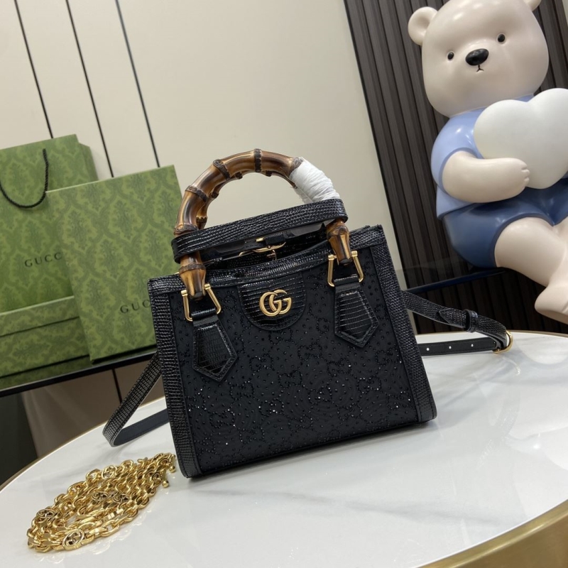 G*u*i top handle bags